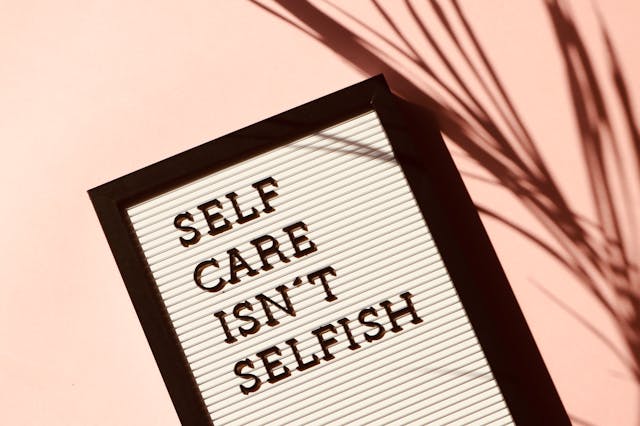 A sign that says Self-care Isn't Selfish.